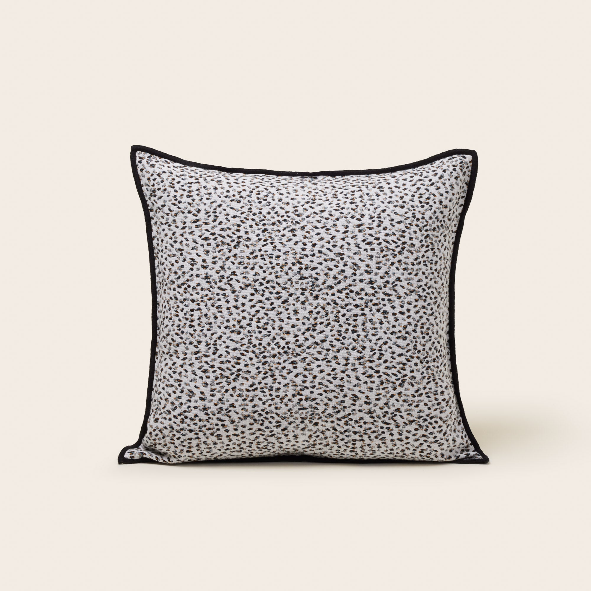 Housse de coussin OCELO ivoire et noir