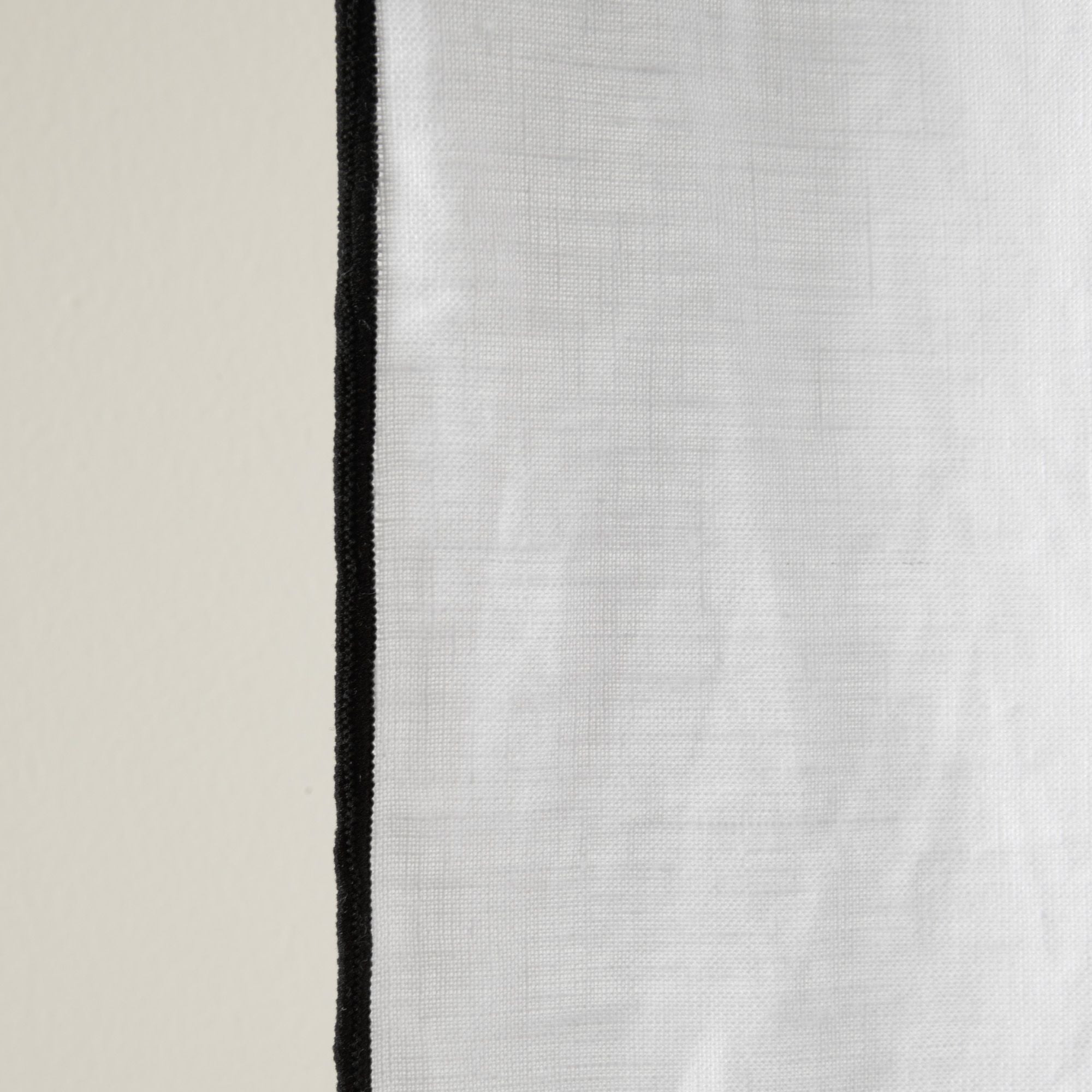 Carlina white and black bourdon stitch black eyelet curtain