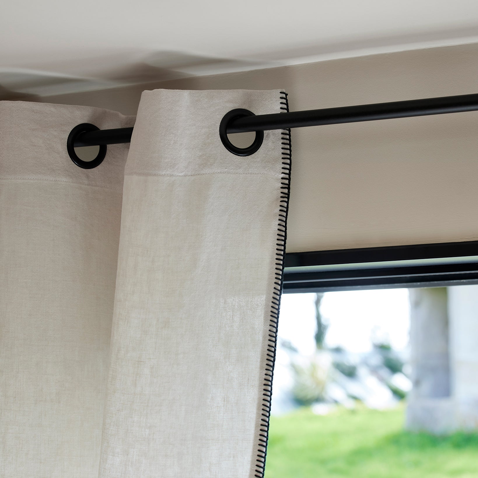 Nino white and black festoon black eyelet curtain